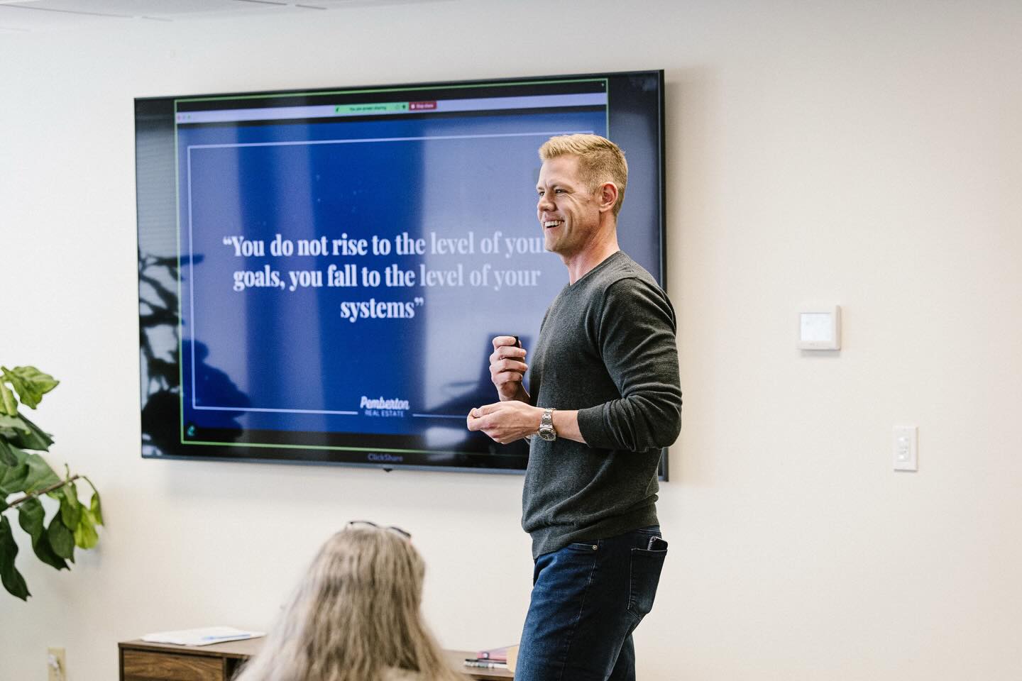 Parker speaking at a Pemberton company meeting